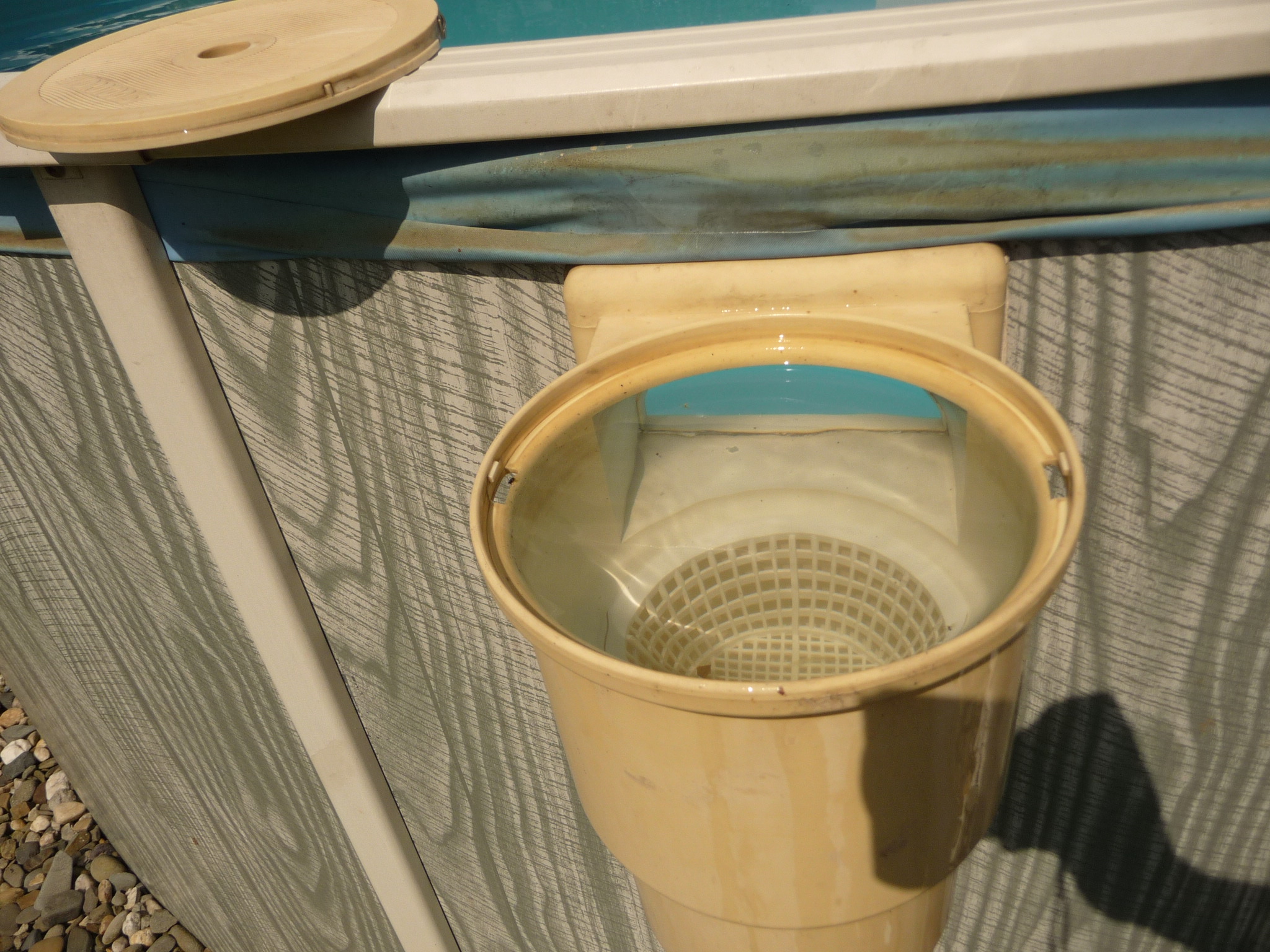 pool maintenance hacks pantyhose on skimmer basket