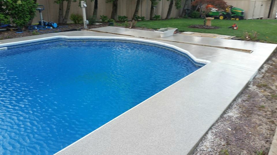 clean the pool deck before opening your swimming pool
