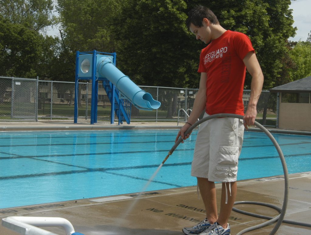 pool opening tips clean pool deck first