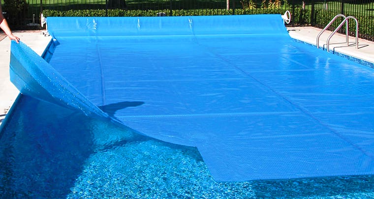 energy saving tips for swimming pools use a solar cover heat retention 