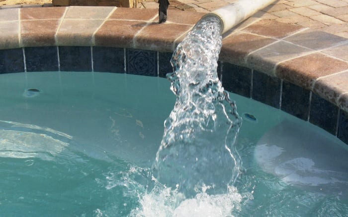 dilute your pool water to lower pool chlorine
