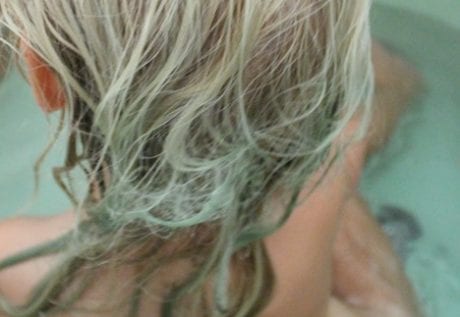 swimming pool myths chlorine turns hair green