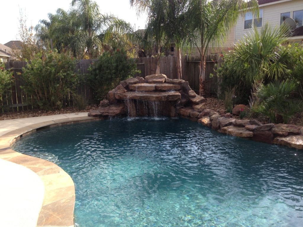 rock waterfall inground pool ideas